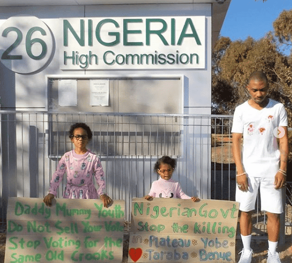 Killings: Nigerian man and his daughetrs protest alone in Australia